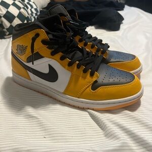 Nike Black and Gold High-Tops